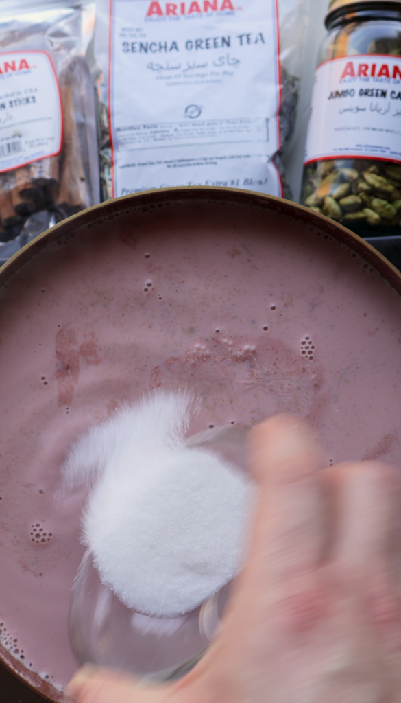 Sugar going into the sheer chai for sweetness